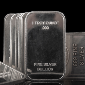 a stack of 1 troy ounce fine silver bullion bars